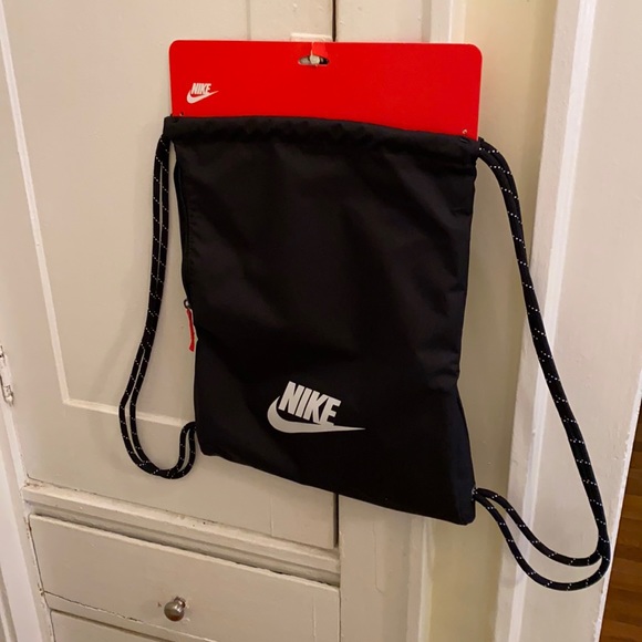 Nike black draw string bag with side zip pocket